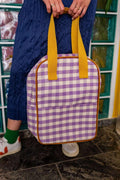 lilac gingham backpack by bettys home held by woman in jeans skirt