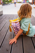 Small gingham retro backpack in lilac with yellow stripes. 