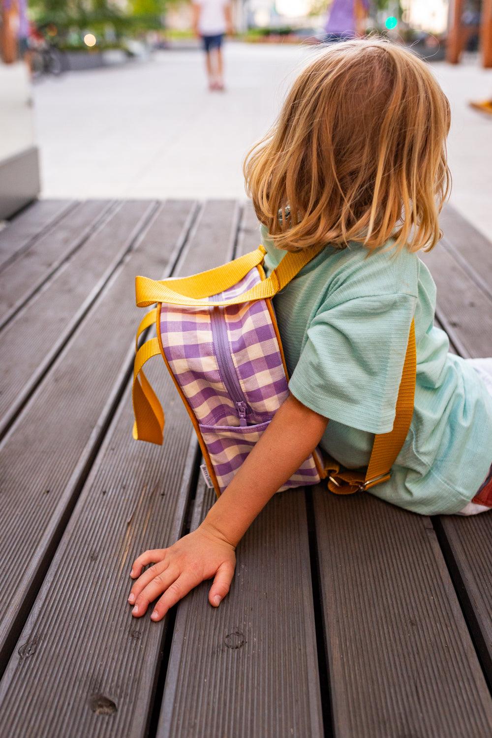 Small gingham retro backpack in lilac with yellow stripes. 