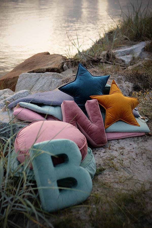 lester pillow b mint on sand over the sea by bettys home