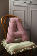 corduroy letter cushion A by bettys home in kids room. Cushion in shape of letter A on chair
