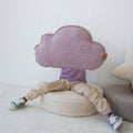 Corduroy Cloud Cushion by Bettys home. cushion in shape of cloud lavender hold by little kid
