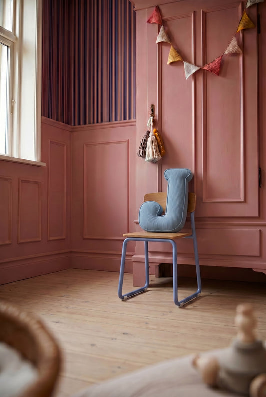 corduroy letter cushion J by bettys home in kids room on chair in kids room. Cushion in shape of letter