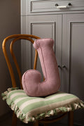 corduroy letter cushion J by bettys home in kids room on chair. Cushion in shape of letter