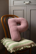 corduroy letter cushion P by bettys home in kids room on chair. Cushion in shape of letter