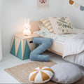 corduroy letter cushion Z by bettys home in kids room on floor next to bed. Cushion in shape of letter