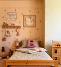 velvet letter cushion B by bettys home in kids room on boucle mattress. Cushion in shape of letter
