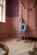 corduroy letter cushion D by bettys home on blu chair