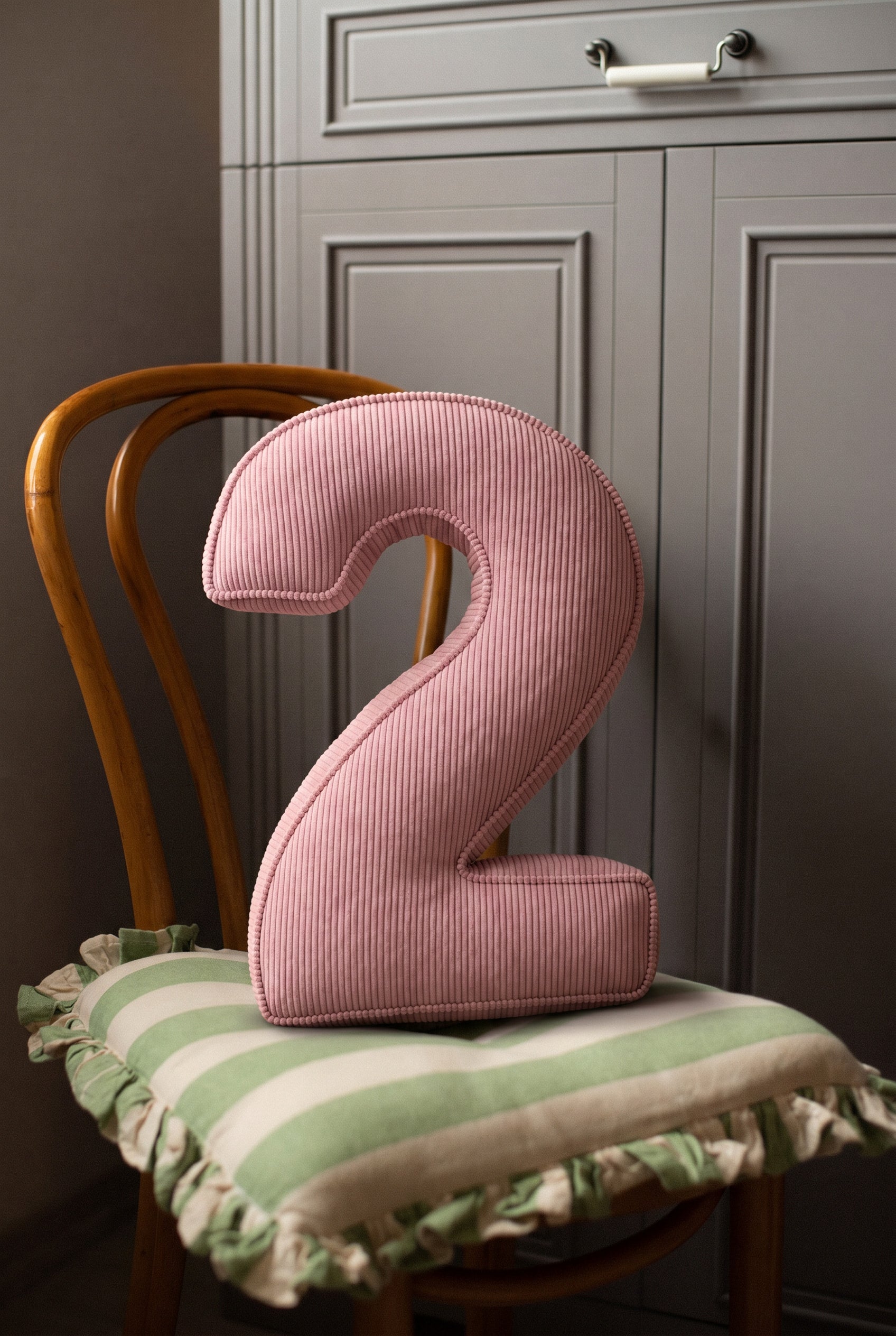 Corduroy Number Cushion by Bettys Home on chair