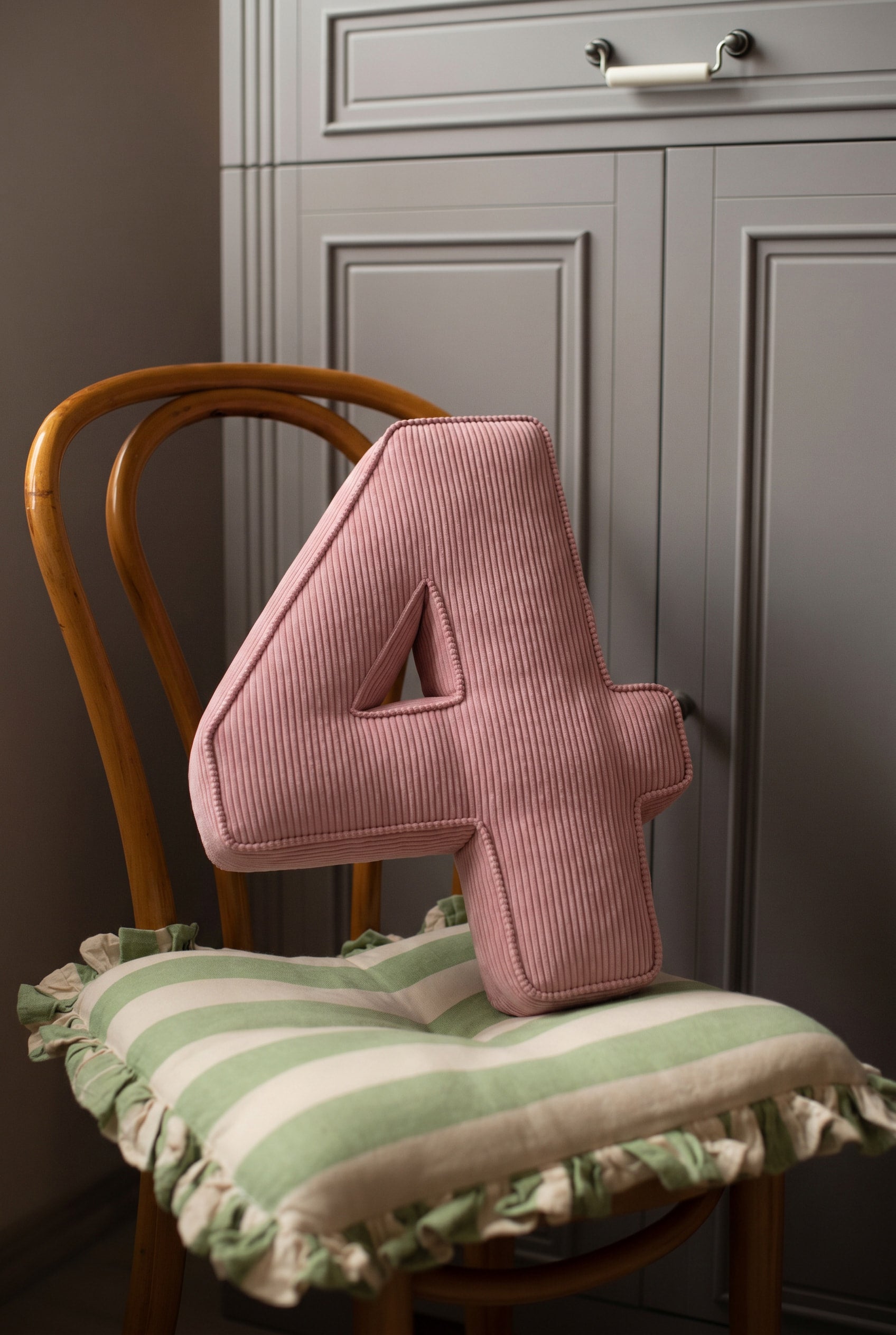 Corduroy Number Cushion by Bettys Home on chair
