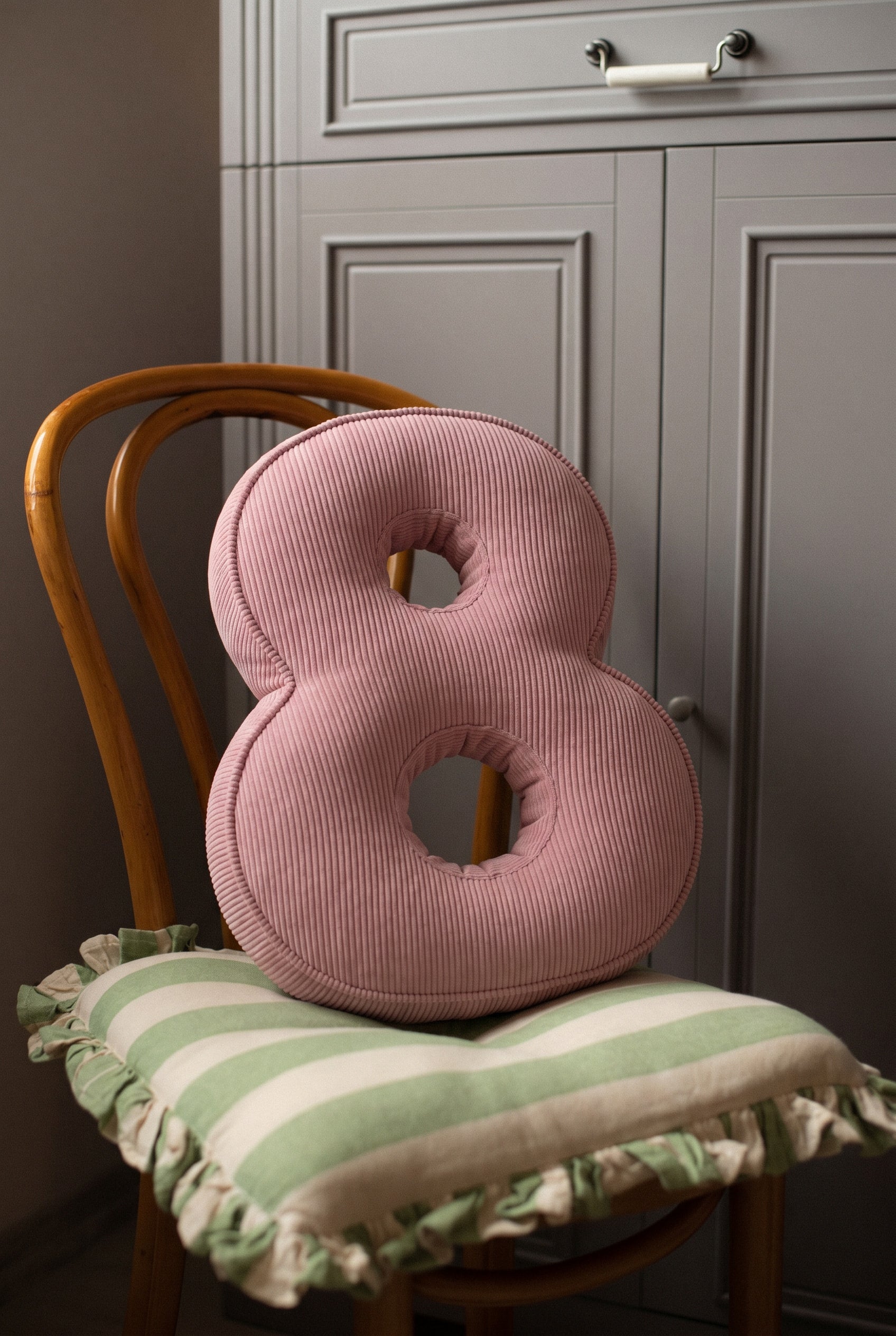 Corduroy Number Cushion by Bettys Home on chair
