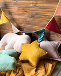 small star cushion in yellow by bettys home with other cushions by bettys home